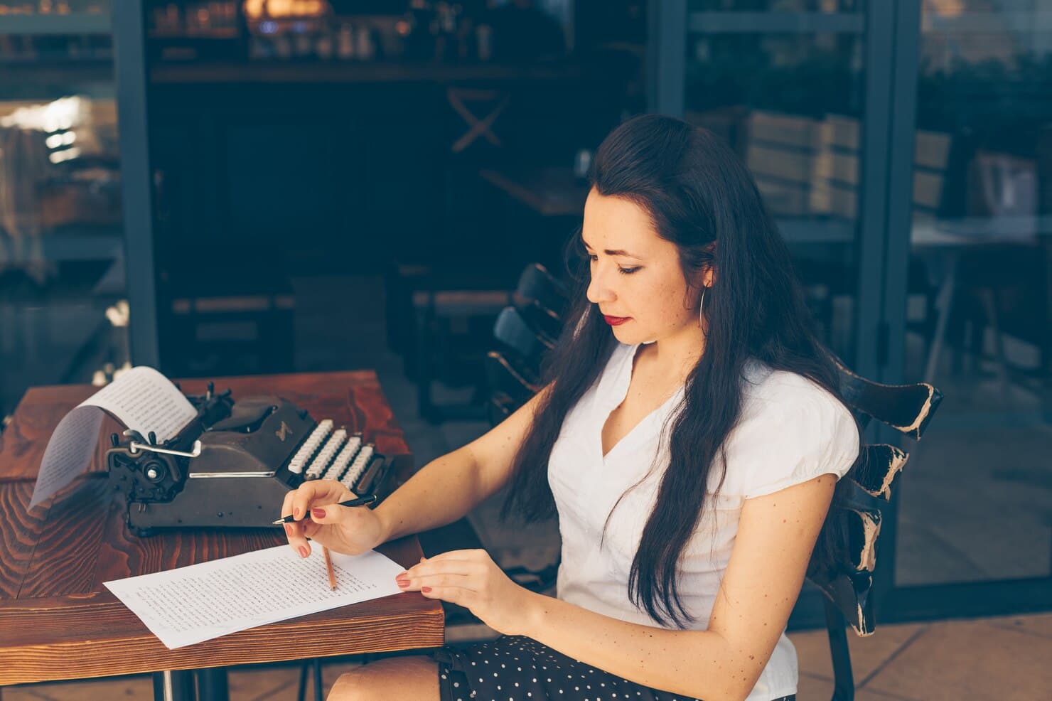 Creator sketching and writing